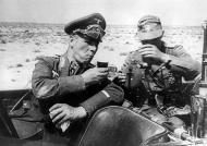 Asisbiz German Cmd GenLt Erwin Rommel Deutsches Afrika Korps DAK in his staff car Libya 1942 01