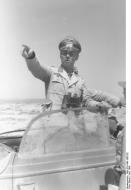 Asisbiz German Cmd GenLt Erwin Rommel Deutsches Afrika Korps DAK in his staff car Libya June 1942 01