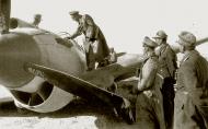 Asisbiz German Cmd GenLt Erwin Rommel Deutsches Afrika Korps DAK with officers inspecting a downed RAF P 40 Tomahawk 01