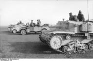Asisbiz German Cmd GenLt Erwin Rommel inspecting Italian troops foreground Italian self propelled gun Semovente 75 18