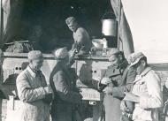 Asisbiz German DAK forces Afrika Korps advancing into Libya photo series troops recieve their water ration ebay 01