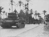 Asisbiz German armor DAK Panzer PzKpfw III units of the German Africa Corps roll through Libya 5th Apr 1941 NIOD