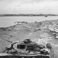 Asisbiz German armor Panzer PzKpfw III tank Ausf J along with sunken ships and a Gotha Go 242 glider at Tobruk 1941 01