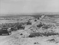 Asisbiz Italian and German DAK Panzer PzKpfw III column on the march through El Broga 16th Apr 1941 NIOD