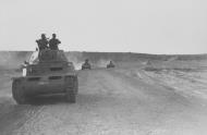 Asisbiz Italian armor tanks moving to the front lines Lybian Desert later known as 1st Battle of El Alamein 27th Jun 1942 NIOD