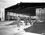 Asisbiz Bomb damaged Hangars at Hickam Field Oahu Dec 1941 SC 176626