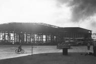 Asisbiz Destroyed Hangar and aircraft destroyed as a result of the Japanese bombing on Pearl Harbor 7th Dec 1941 80 G 32494