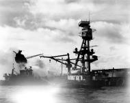 Asisbiz Harbor tug and a garbage lighter fighting fires on the USS Arizona (BB 39) Pearl Harbor Attack 7th Dec 1941 NH 97382