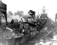 Asisbiz USS Downes (DD 375) left and USS Cassin (DD 372) capsized Pearl Harbor Navy Yard drydock on 7th Dec 1941 80 G 32511