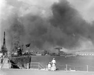 Asisbiz View looking toward the Navy Yard from the Submarine Base during the attack on Pearl Harbor 7th Dec 1941 80 G 32704