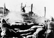 Asisbiz Insurgent fighter tosses a hand grenade at loyalist soldiers Burgos Spain 12th Sep 1936 01