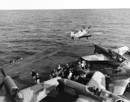 Asisbiz Curtiss P 40F Warhawks taking off from USS Chenango (CVE 28) operation Torch 10th Nov 1942 80 G 30512