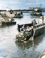 Asisbiz Jeep rolling off a landing boat at Fedala harbor during the landing operations Torch Nov 1942 Lot 11582 19