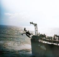 Asisbiz USS Philadelphia (CL 41) recovers one of her Curtiss SOC Seagull during operation Torch Nov 1942 80 G 470061