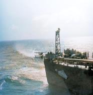 Asisbiz USS Philadelphia (CL 41) recovers one of her Curtiss SOC Seagull during operation Torch Nov 1942 80 G 470062