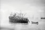 Asisbiz USS Thomas Stone (APA 29) was torpedoed by U 205 was towed to Algiers harbour 7th Nov 1942 IWM A12749