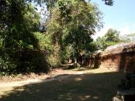 Asisbiz A Banteay Kdei Temple Gopura IV E Bayon style laterite walls 04