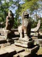 Asisbiz B Banteay Kdei Temple terrace with naga balustrade lion guardians Angkor 04