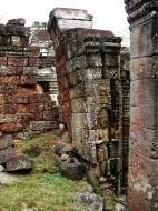 Asisbiz Preah Khan Bas relief mythic guardians Dvarapalas stand on guard 05