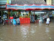 Asisbiz Madurai Sri Meenakshi Temple main road flooding India May 2005 09