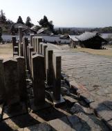 Asisbiz Nigatsu do engraved stone pillars Nara Japan sakura 04