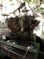 Asisbiz Nigatsu do hall main stone natural spring washing area not for drinking 01