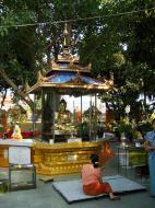 Asisbiz Yangon A Thi Tha Di Bronze Statue of Buddha garden area Dec 2009 02