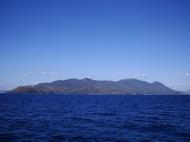 Asisbiz Bagalangit Point lighthouse Calumpan Peninsula viewed from a banca Anilao Batangas 01