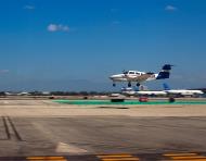 Asisbiz Holding sort RWY34L as a Beech 76 Duchess lands on RWY25L Long Beach California 02