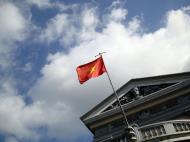Asisbiz HCMC Museum Vietnamese flag flying high 2009 02