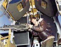 Asisbiz WWII close up color photo of Consolidated B 24 Liberator starboard waist gunners position 01