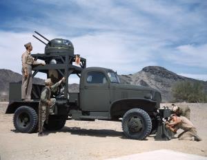 Asisbiz WWII color photo of a Utility Vehicle as a Mobile Practice Turret for Gunnery Instruction 01