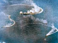 Asisbiz Japanese aircraft carrier Zuikaku (c) and two destroyers maneuvering Battle of the Philippine Sea June 1944 80 G 238025