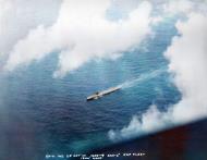 Asisbiz USN photos taken during battle off Cape Engano showing one of the five carriers involved during the battle 25th Oct 1944 NH 95545