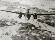 Asisbiz Douglas A 26 Invaders dropping bombs on the Siegfried Line in a line abreast formation 01