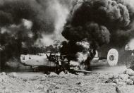 Asisbiz 44 40976 B 24J Liberator 13AF 307BG372BS destroyed by fire on Munda New Georgia 1944 02