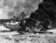 Asisbiz 44 40976 B 24J Liberator 13AF 307BG372BS destroyed by fire on Munda New Georgia 1944 03