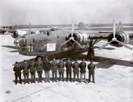 Asisbiz 41 11613 B 24D Liberator 15AF 376BG514BS 71 The Blue Streak with her crew during award ceremony 03