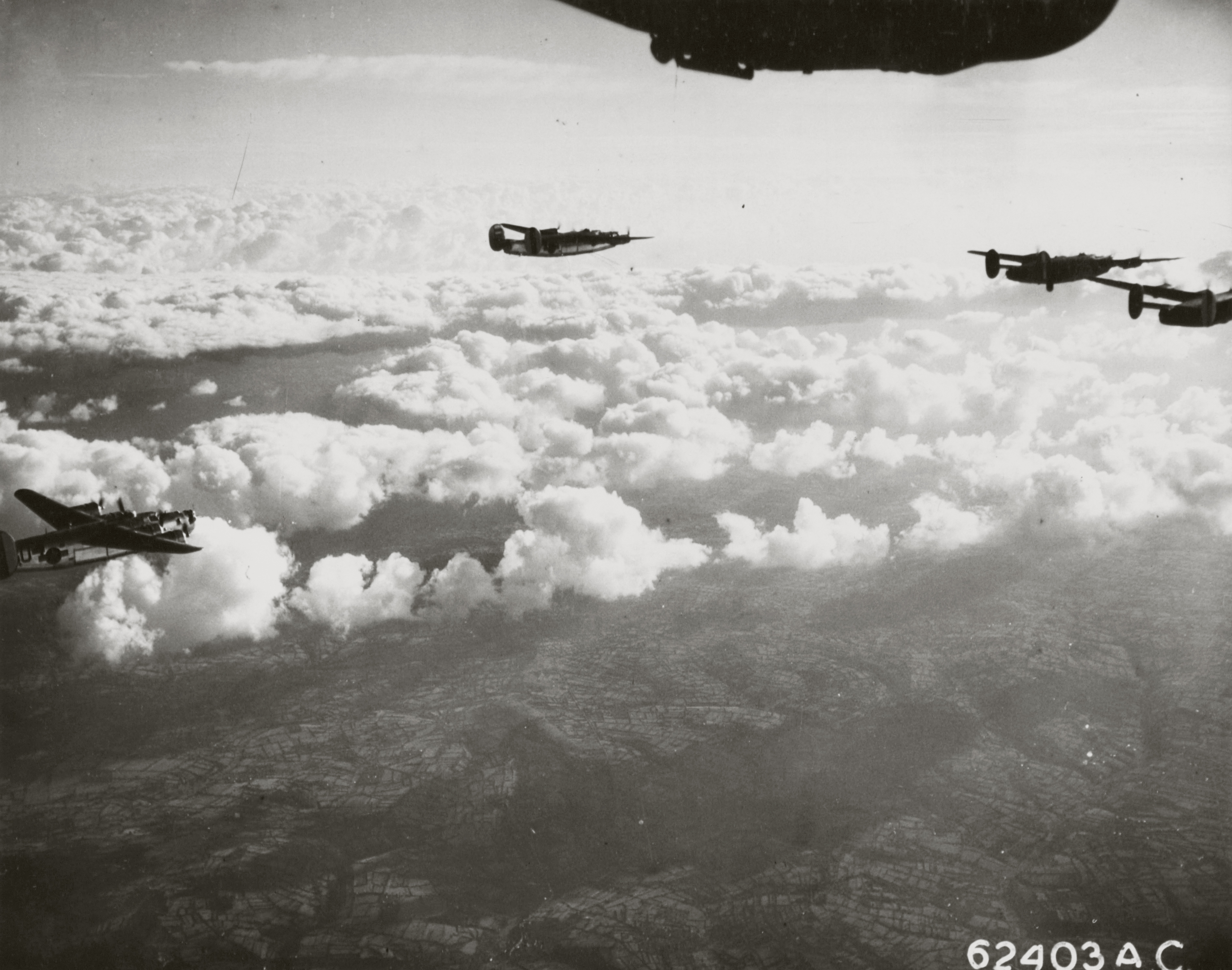 Asisbiz Consolidated B-24 Liberators 8AF 392BG enroute to the drop zone ...