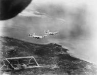 Asisbiz Consolidated B 24 Liberator 5AF 43BG65BS head back to base after hiting a Jap airfield 1944 01