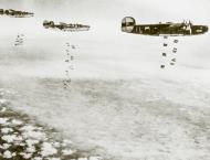 Asisbiz 41 29144 B 24H Liberator 8AF 446BG704BS FLP Ronnie over the Rheine Marshalling Yards 9th Mar 1945 01