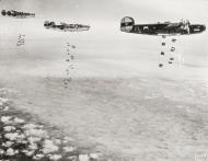 Asisbiz 41 29144 B 24H Liberator 8AF 446BG704BS FLP Ronnie over the Rheine Marshalling Yards 9th Mar 1945 FRE1750