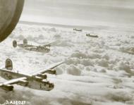 Asisbiz 41 28958 B 24H Liberator 8AF 448BG713BS IGP Little Joe in formation with IGN on a mission 24th Nov 1944 FRE14369