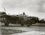 Asisbiz 42 7591 B 24H Liberator 8AF 448BG712BS CTJ Fat Stuff II returns from Berlin mission 22nd March 1944 01