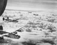 Asisbiz 44 10556 B 24H Liberator 8AF 448BG713BS IGN Mother of Ten in formation with IGP on a mission 24th Nov 1944 01