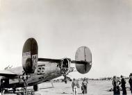 Asisbiz 42 78595 B 24J Liberator 15AF 451BG725BS 56 with battle damage to her tail 28th Oct 1944 01