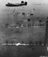 Asisbiz Consolidated B 24 Liberator 8AF 453BG735BS H6L dropping supplies Rhine River 24th March 1945 01