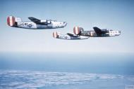 Asisbiz 44 40066 B 24J Liberator 8AF 458BG753BS J4V SOL in formation with a flight assembly ship Sep 1944 FRE6711