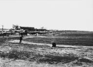 Asisbiz Consolidated B 24 Liberators 458BG line up for take off at Horsham St Faith for their next mission FRE1911