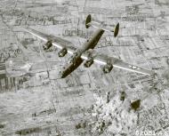 Asisbiz Consolidated B 24 Liberators 15AF Y over the drop zone Nyiregyhaza Hungary 6th Sep 1944 01